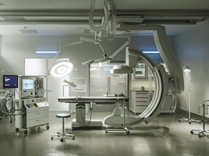 Branche Medizintechnik; Untersuchungszimmer mit verschiedenen Geräten auf Rollen;